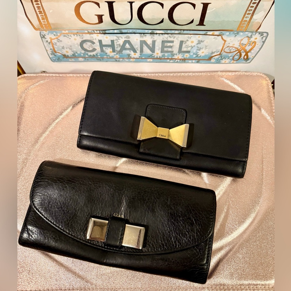 Bundle of two Chloe wallets . Black leather with Brass and silver hardware.